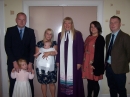 The family gather before Holly's baptism
